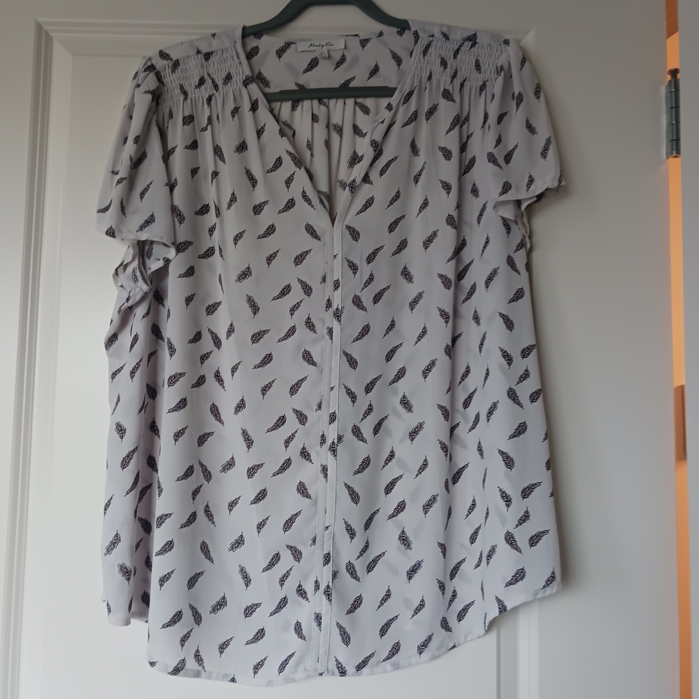 Elegant White Blouse with Black Leaf Pattern